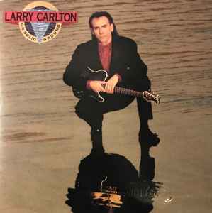 Larry Carlton - On Solid Ground album cover