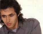 ladda ner album JeanJacques Goldman - Entre Gris Clair Et Gris Foncé