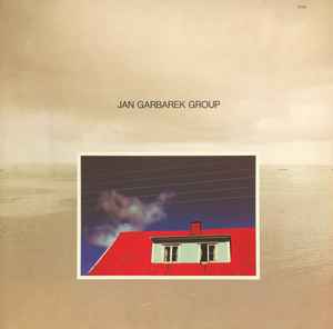 Jan Garbarek Group - Photo With Blue Sky, White Cloud, Wires, Windows And A Red Roof album cover
