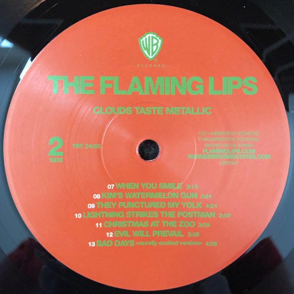 Album herunterladen The Flaming Lips - Clouds Taste Metallic