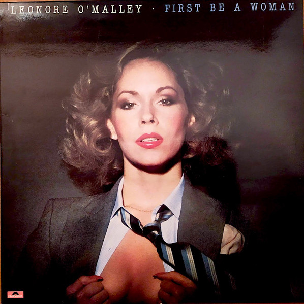 Leonore O'Malley - First Be A Woman | Releases | Discogs
