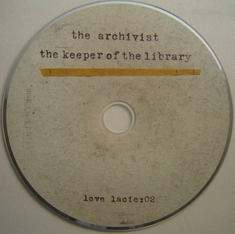 last ned album The Archivist - The Keeper Of The Library