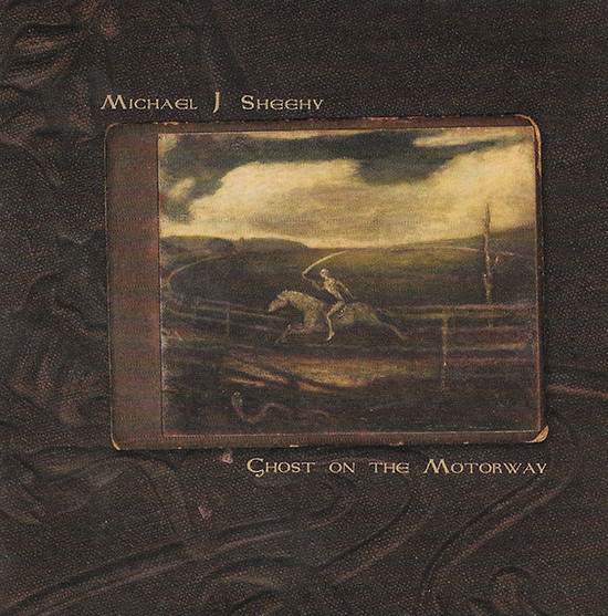 last ned album Michael J Sheehy - Ghost On The Motorway