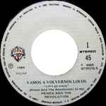 Cover of Vamos A Volvernos Locos = Let's Go Crazy, 1984, Vinyl