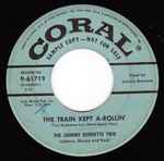 The Johnny Burnette Trio – The Train Kept A-Rollin' (1956