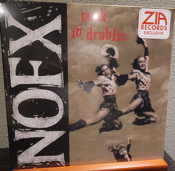 NOFX – Punk in Drublic (2022, Beer Transparent With Red Splatter 