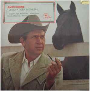 Buck Owens - I've Got A Tiger By The Tail album cover