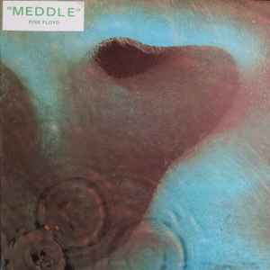 Pink Floyd - Today we mark the release of Meddle in 1971. Famously  featuring a close-up of an ear underwater, with some ripples, on the  standard cover, the reel-to-reel tape cover instead