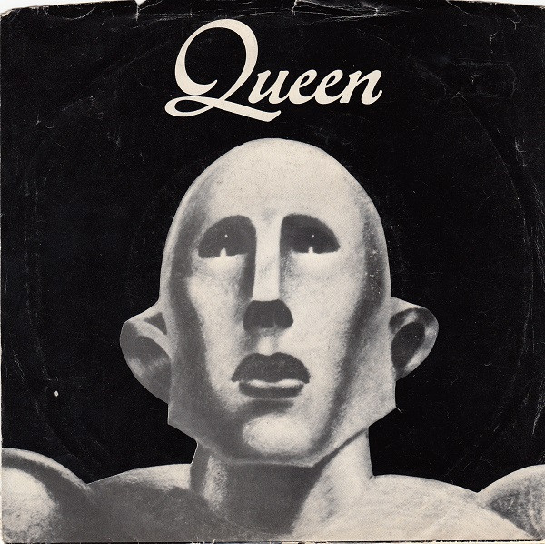 Queen – We Are The Champions / We Will Rock You (Allied 
