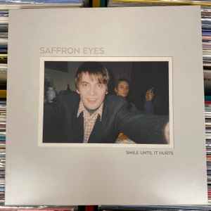 Saffron Eyes - Smile Until It Hurts album cover