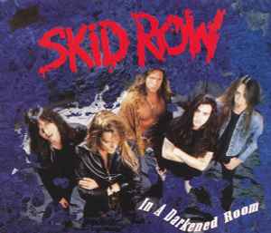 Skid Row - In A Darkened Room album cover