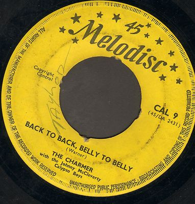 baixar álbum The Charmer - Back To Back Belly To Belly Is She Is Or Is She Aint