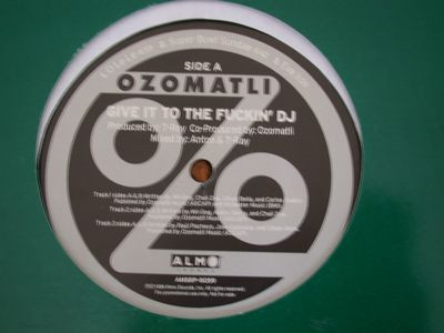 Ozomatli – Give It To The Fuckin' DJ (1998, Vinyl) - Discogs