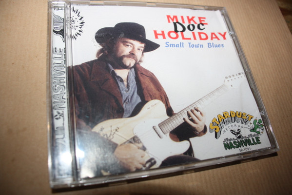 last ned album Mike Doc Holiday - Small Town Blues