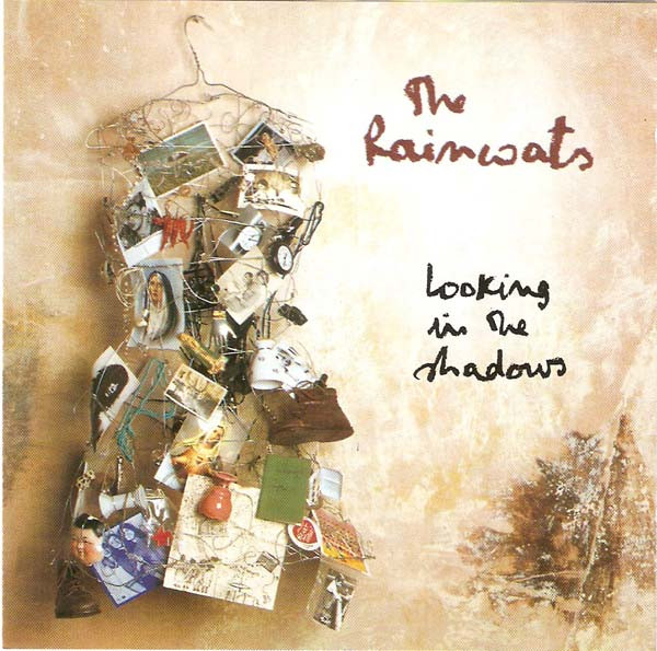 descargar álbum Download The Raincoats - Looking In The Shadows album