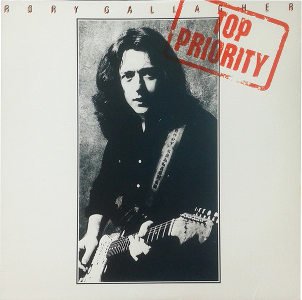 Top prority / Rory Gallagher | Gallagher, Rory (1948-1995) - guitariste et chanteur irlandais. Interprète