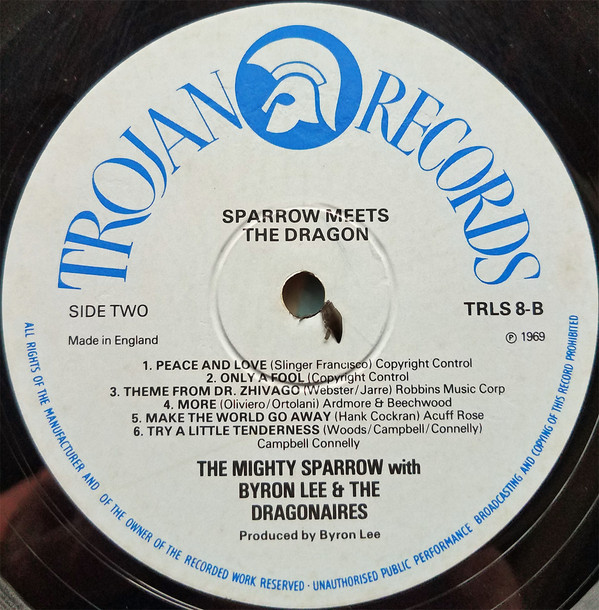 last ned album Mighty Sparrow With Byron Lee And The Dragonaires - Sparrow Meets The Dragon