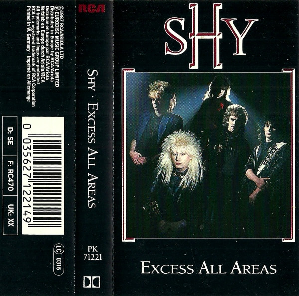 Shy = シャイ – Excess All Areas = イクセス・オール・エリアズ (1996