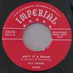 Cover of Ain't It A Shame / La-La, 1955-04-00, Vinyl