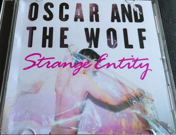 lataa albumi Oscar And The Wolf - Strange Entity