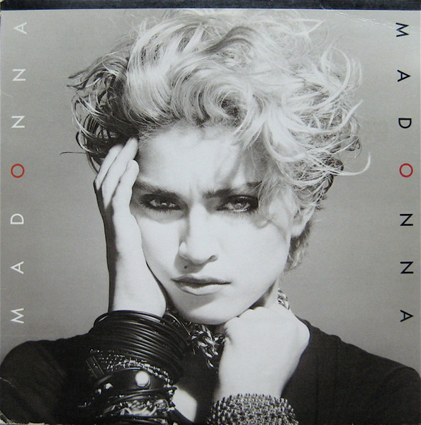 Dance, pop and disco artist, Madonna music album on vinyl record LP disc.  Titled: Madonna The First Album, album cover Stock Photo - Alamy