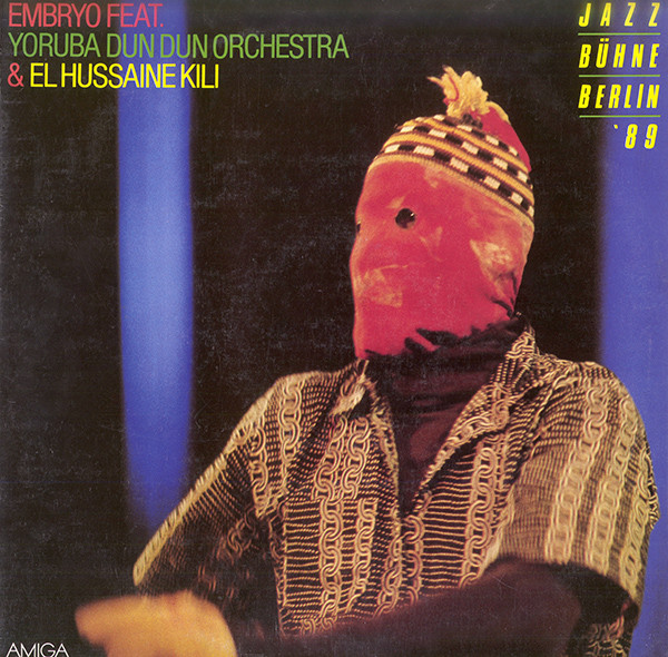 descargar álbum Embryo Feat Yoruba Dun Dun Orchestra & El Hussaine Kili - Jazzbühne Berlin 89