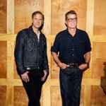 last ned album Calexico - World Drifts In