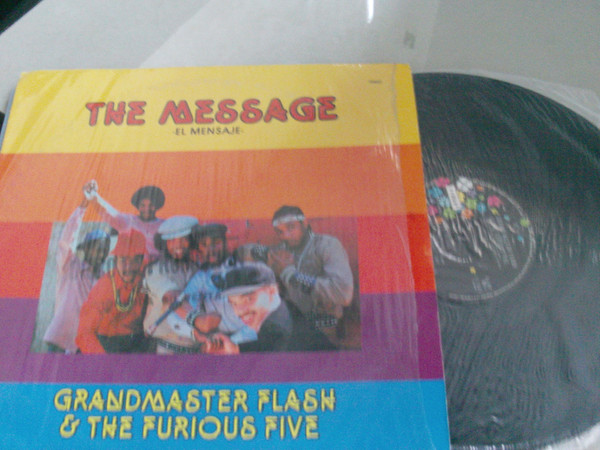 Album herunterladen Grand Master Flash & The Furious Five Feat Melle Mel & Duke Bootee - The Message El Mensaje