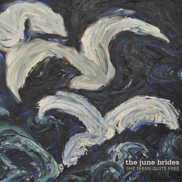 lataa albumi The June Brides - She Seems Quite Free