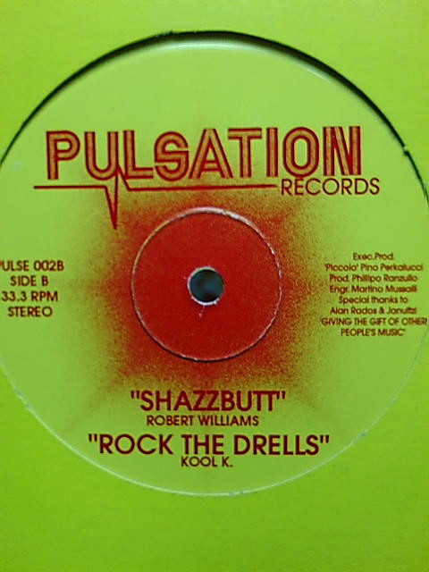 baixar álbum Con Bacon Kool K Robert Williams - Primo Vera Rock The Drells Shazzbutt