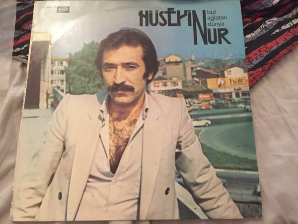 descargar álbum Hüseyin Nur - Bizi Ağlatan Dünya