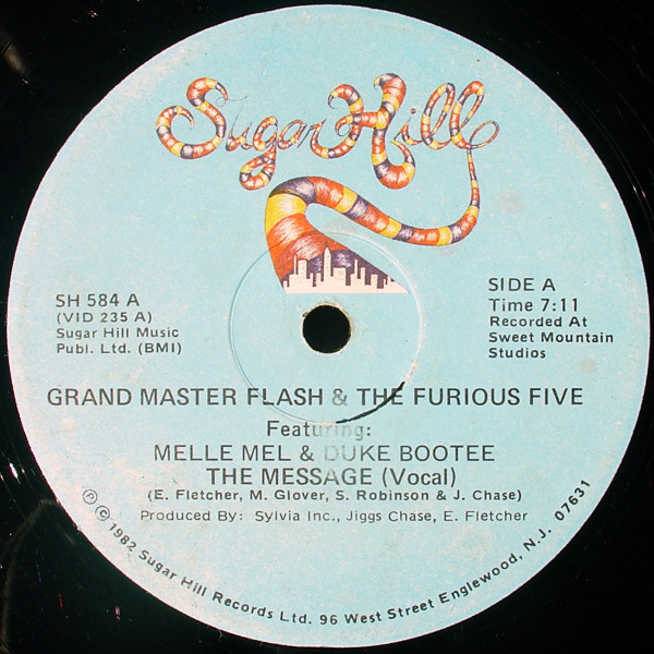 Grand Master Flash & The Furious Five Featuring: Melle Mel & Duke