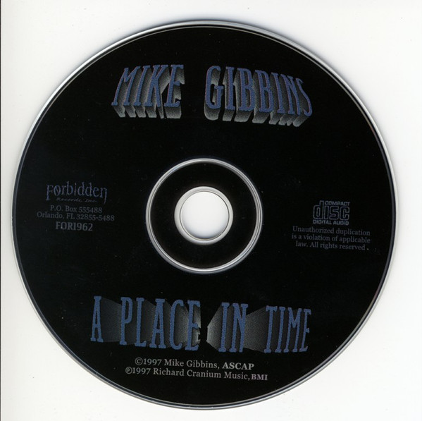 last ned album Mike Gibbins - A Place In Time