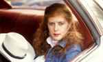last ned album Kirsty MacColl - Theres A Guy Works Down The Truck Stop Swears Hes Elvis