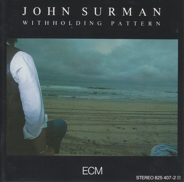 Withholding / John Surman, saxophoniste, clarinettiste, pianiste | Surman, John (1944) - saxophoniste, clarinettiste anglais. Interprète