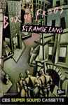 Cover of Strange Land, 1986, Cassette