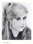baixar álbum Kirsty MacColl - Theres A Guy Works Down The Truck Stop Swears Hes Elvis