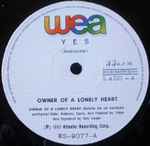 Cover of Owner Of A Lonely Heart = Dueño De Un Corazón Solitario, 1983, Vinyl